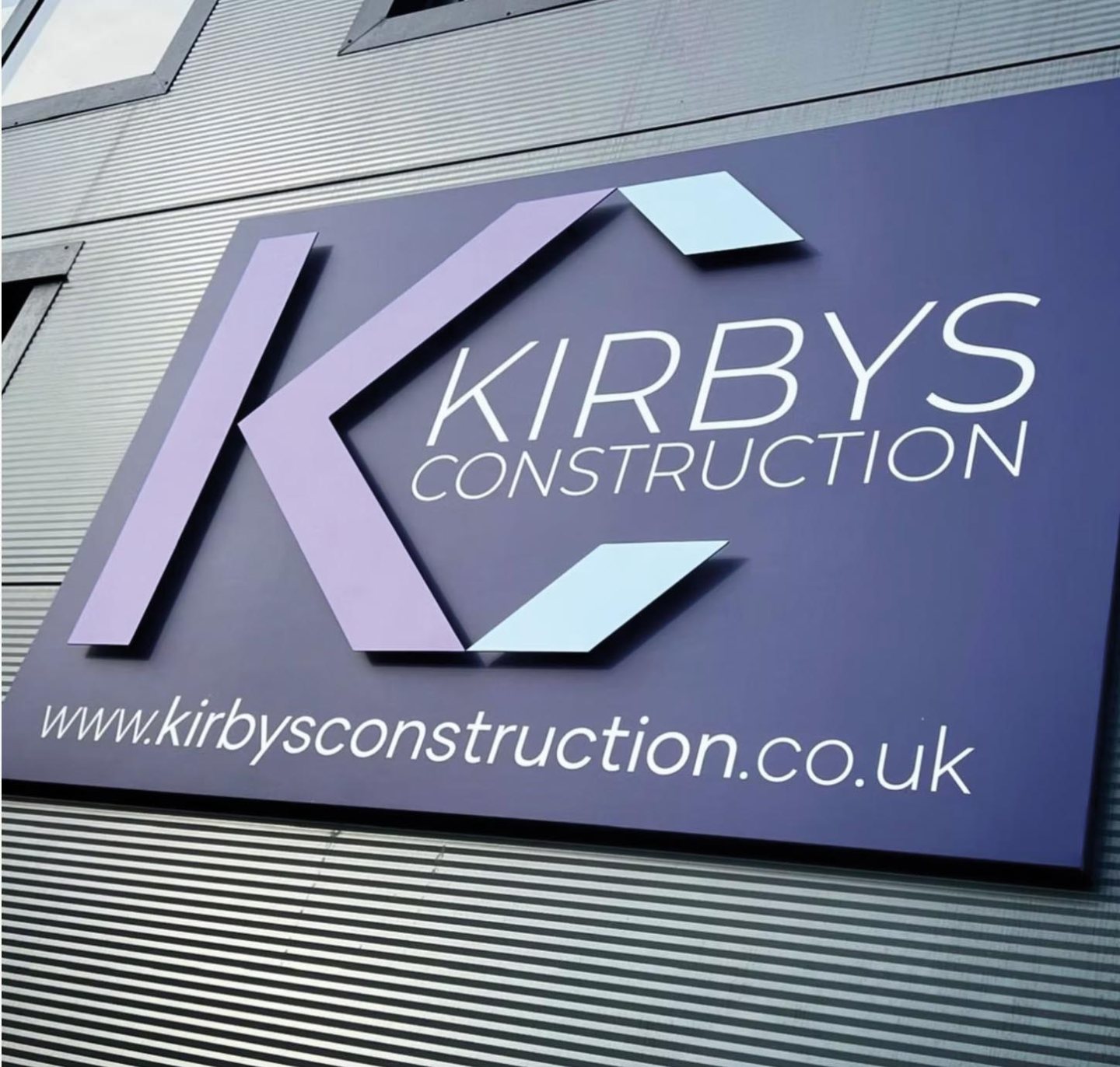 kirbys folded tray sign with acm lettering on stand-off fixings