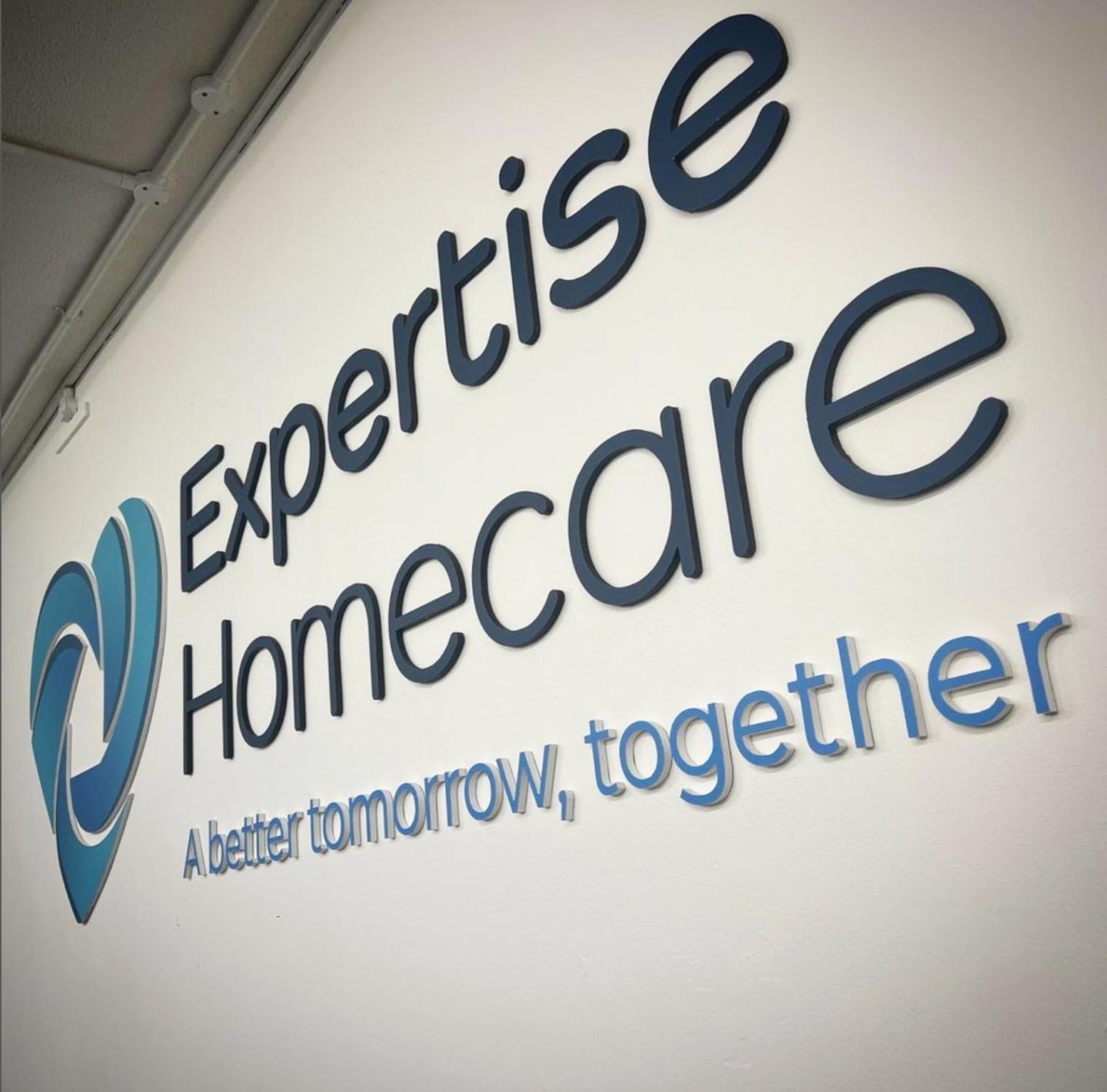 foamex wall logo for expertise homecare