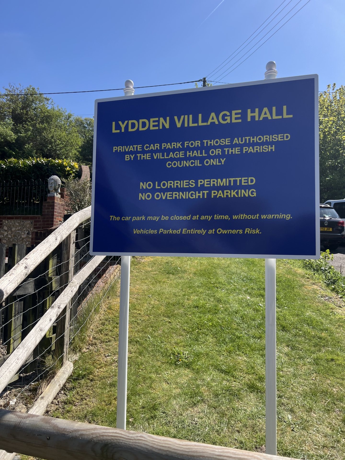 Lydden Village Hall post and panel sign on a sunny day