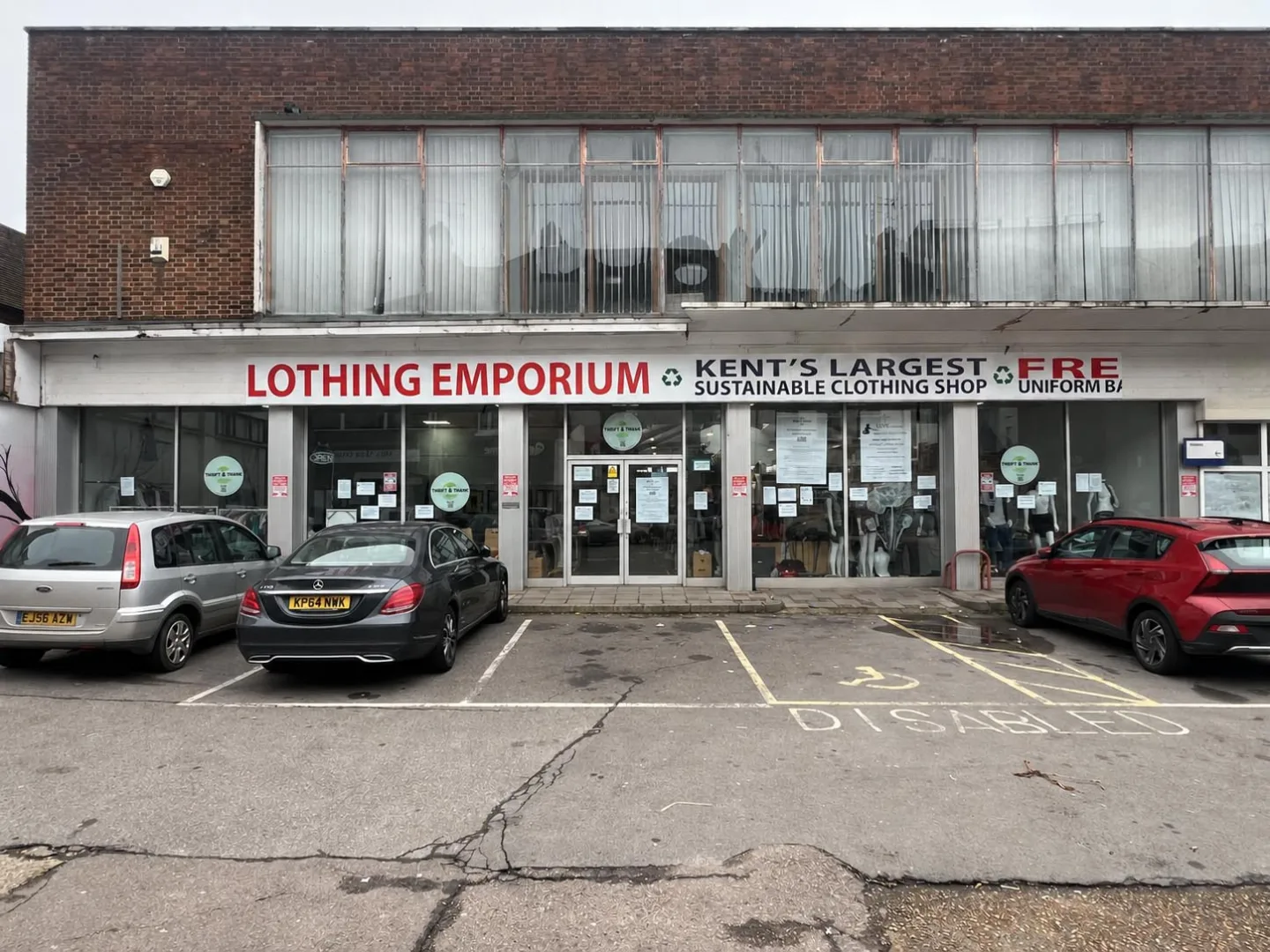 Original Thrift & Thrive shopfront on Chatham High Street, Kent, showing the white fascia with red and black lettering before its transformation into Revival.